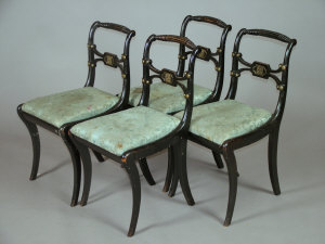 Appraisal: A set of four ebonised chairs NOTE REGENCY NOT th