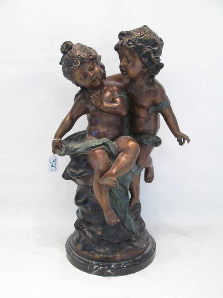 Appraisal: PATINATED BRONZE SCULPTURE of two cherubs after A Moreau sculpture