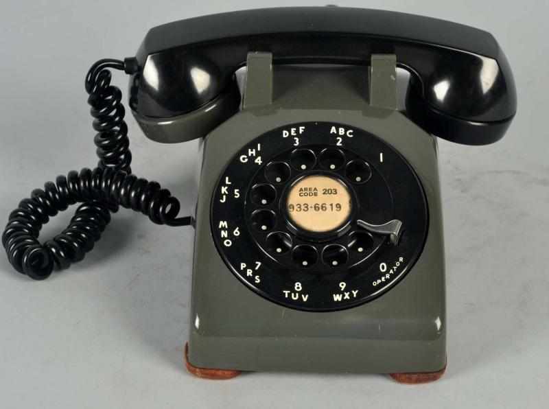 Appraisal: Western Electric Gray Black Cradle Telephone Plastic shell dated base