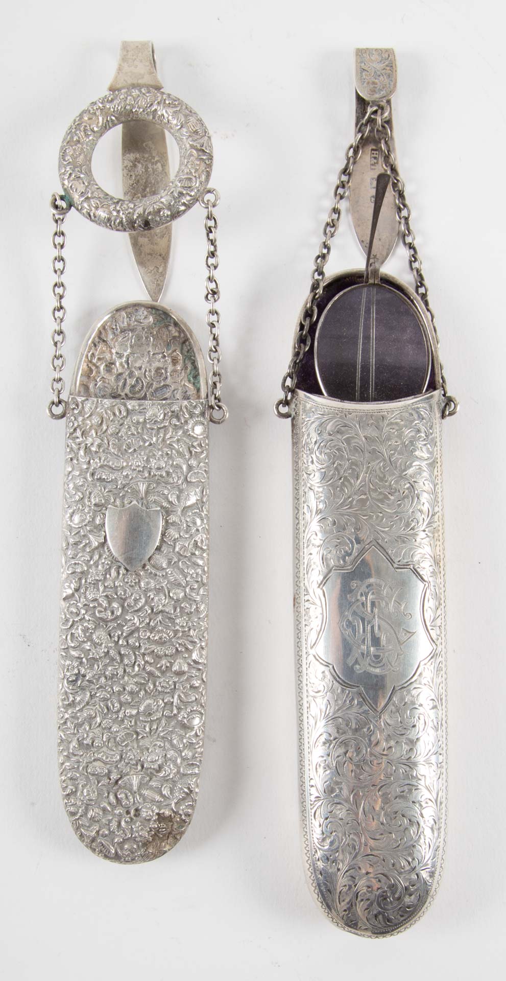 Appraisal: Two English sterling silver glass cases English felt-lined engraved sterling