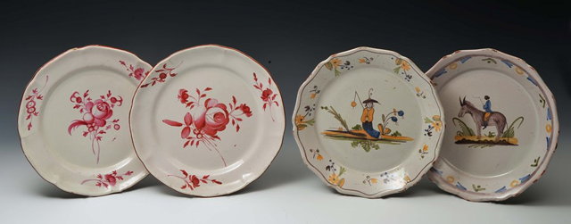 Appraisal: A PAIR OF FRENCH FAIENCE POLYCHROME PLATES late th Century