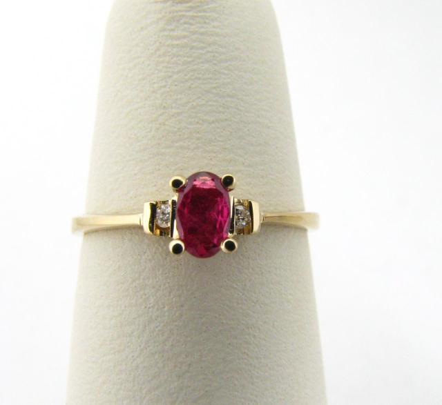 Appraisal: K Yellow Gold Oval Ruby and Diamond First Promise Ring