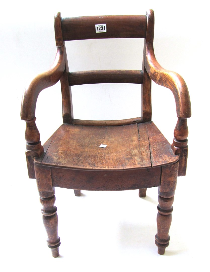 Appraisal: A th century child's stained beech and oak open armchair