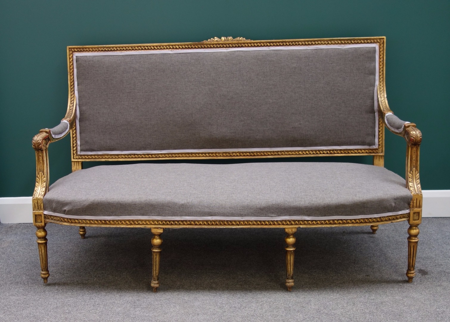 Appraisal: A Louis XVI style gilt canape sofa with floral crest