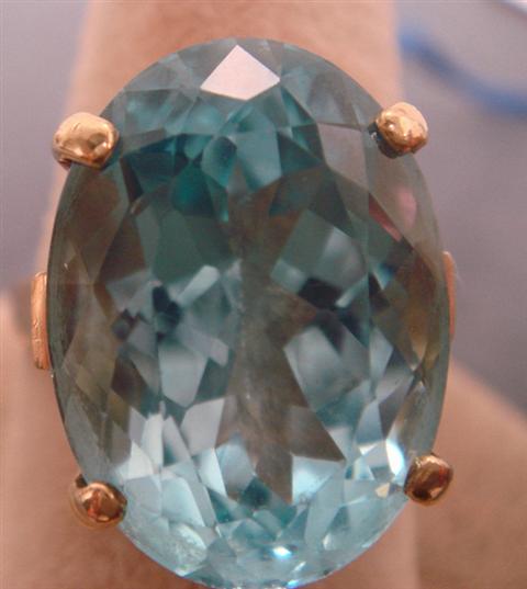 Appraisal: K YG blue topaz ring mm x mm size w