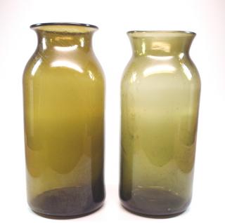 Appraisal: Free Two early th century free-blown glass storage jars Medium