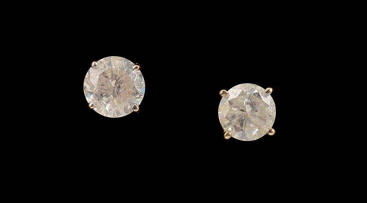 Appraisal: CT DIAMOND STUD EARRINGS Two round brilliant diamonds in k