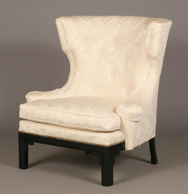 Appraisal: Vintage Hollywood Regency upholstered wide wing chair with Chinese inspired