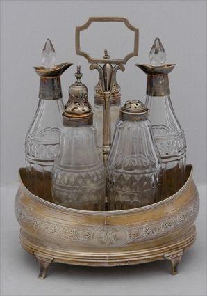 Appraisal: GEORGE III MONOGRAMMED SILVER CRUET FRAME Maker's mark rubbed London