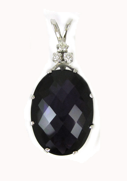 Appraisal: AMETHYST AND DIAMOND PENDANT k white gold with three round-cut