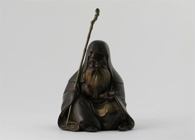 Appraisal: A Japanese bronze seated figure of Jurojin wearing a cloak