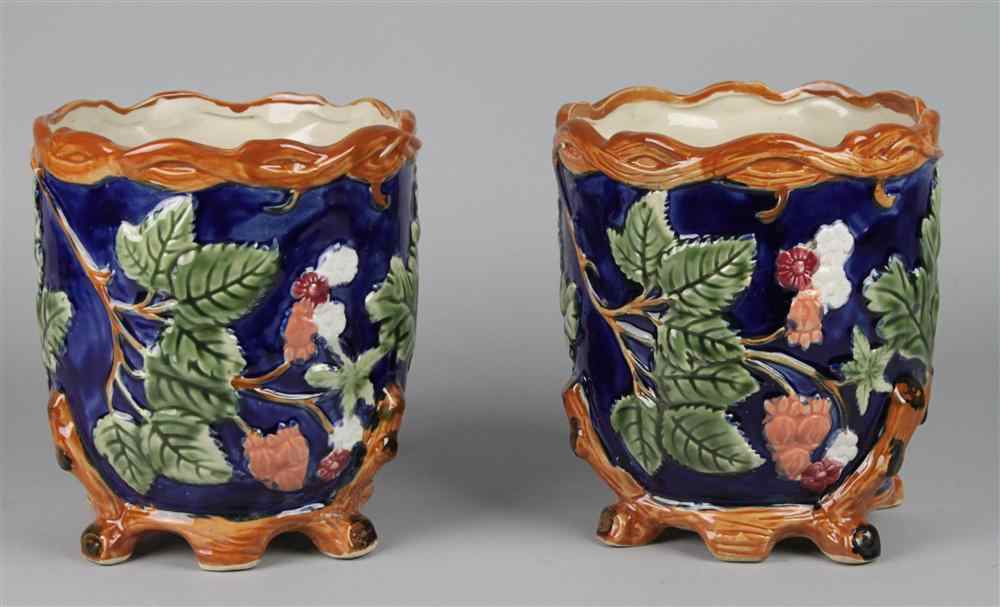 Appraisal: PAIR OF BLUE GROUND MAJOLICA CACHE-POTS molded and colored with