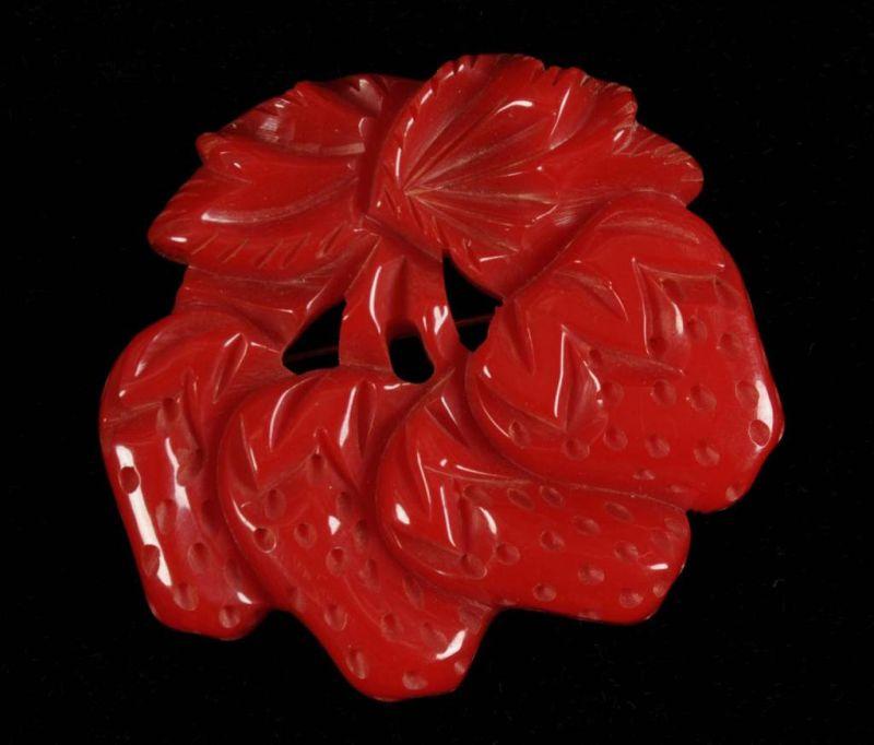 Appraisal: Bakelite Red Carved Strawberry Pin Condition Near Mint Size -