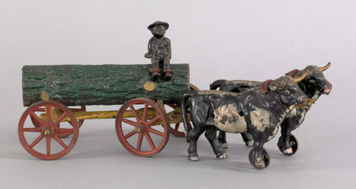 Appraisal: Kenton cast iron log wagon with oxen late th c