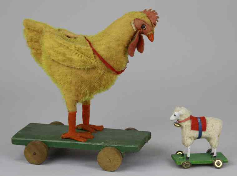 Appraisal: LAMB CHICKEN ON PLATFORM PULL TOYS Small composition head lamb