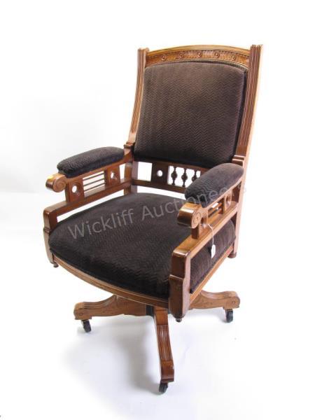 Appraisal: An Eastlake period executive office chair with carved wood frame