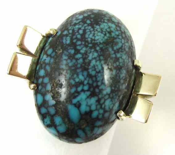 Appraisal: TURQUOISE AND FOURTEEN KARAT GOLD RING set with a large