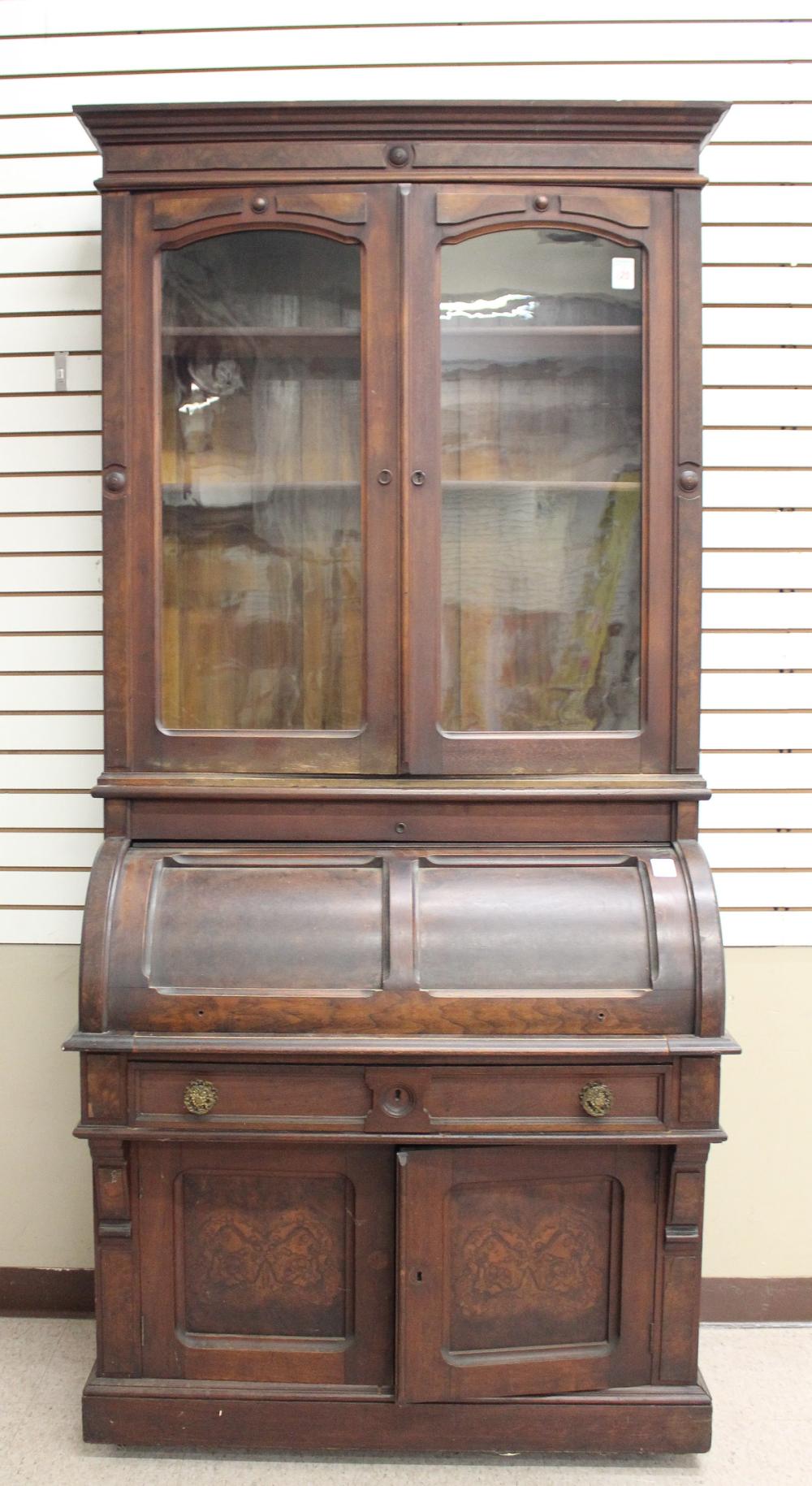 Appraisal: VICTORIAN WALNUT CYLINDER-ROLL SECRETARY BOOKCASE American th century H x