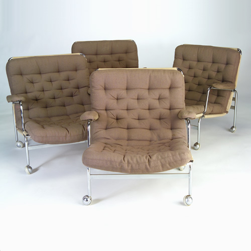 Appraisal: BRUNO MATHESON Set of four armchairs with sling seat support