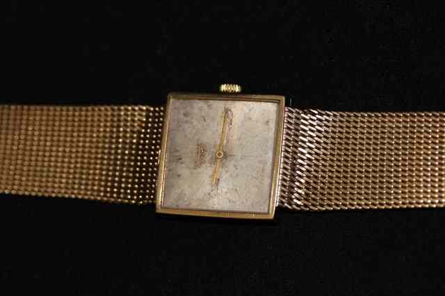 Appraisal: A LONGINES CT GOLD GENTLEMAN'S WRIST WATCH with square dial