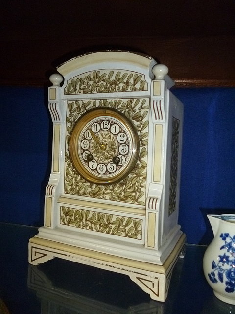 Appraisal: A VICTORIAN POTTERY MANTEL CLOCK in the manner of Lewis