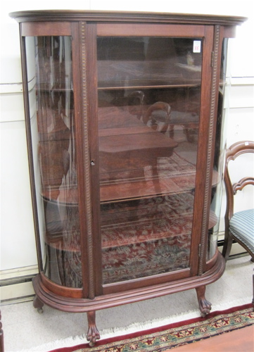 Appraisal: MAHOGANY FINISH AND CURVED GLASS CHINA DISPLAY CABINET American c