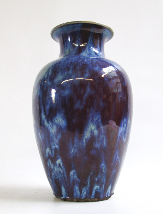 Appraisal: A CHINESE FLAMBE-GLAZED POTTERY VASE th century the exterior covered