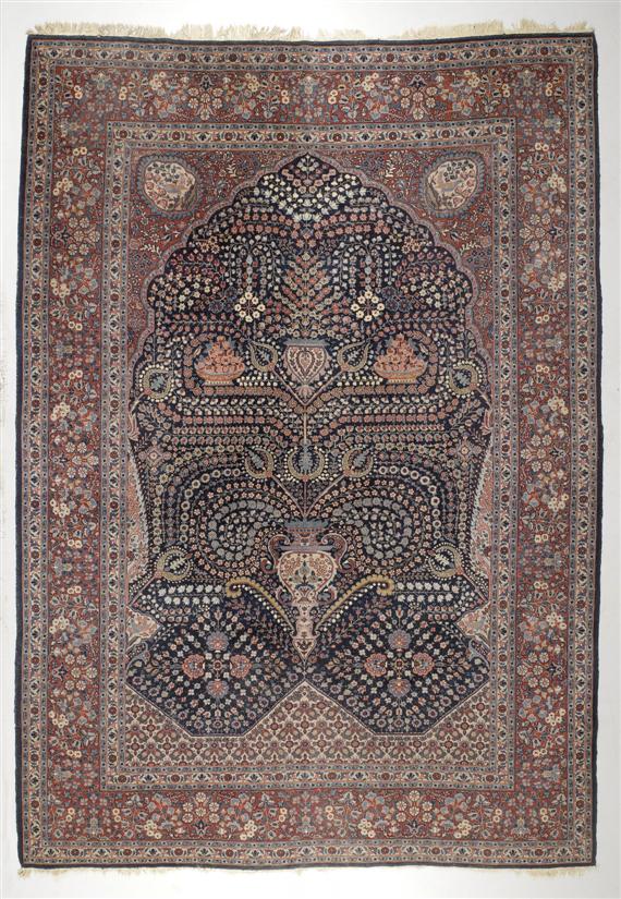 Appraisal: KIRMAN old Blue central field with plant motifs in harmonious