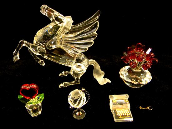 Appraisal: Five Swarovski figures four with original packaging Pegasus fabulous creatures