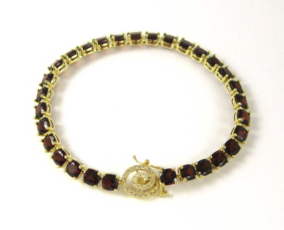 Appraisal: GARNET DIAMOND AND TEN KARAT GOLD BRACELET measuring - inches