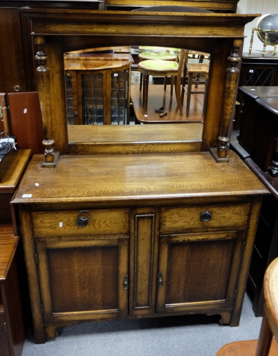 Appraisal: Oak s mirror back sideboard