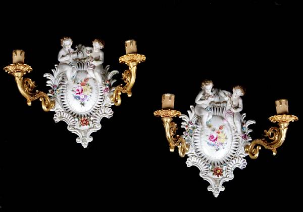 Appraisal: A pair of Italian Rococo style porcelain and bronze two