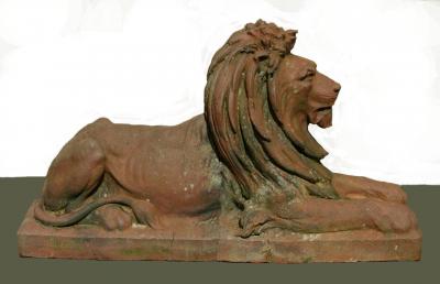 Appraisal: A DOULTON LAMBETH TERRACOTTA FIGURE of a recumbent lion raised