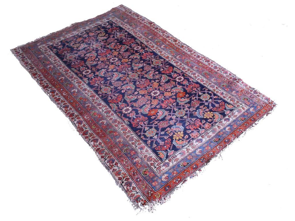 Appraisal: Persian style prayer mat the centre worked with geometric foliate