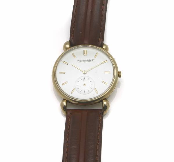 Appraisal: IWC An k gold circular cased wristwatch with heavy shoulders