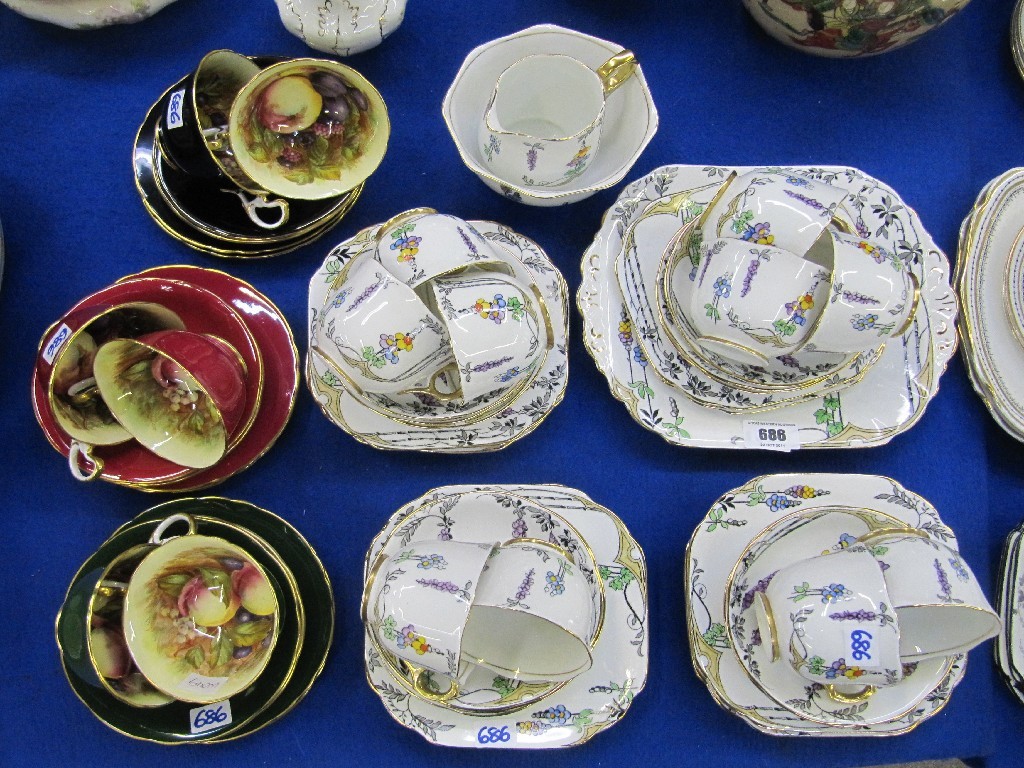 Appraisal: Six Aynsley fruit decorated trios and a Melba bone china