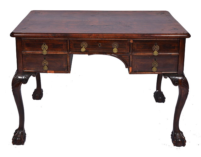 Appraisal: AN TH CENTURY STYLE WALNUT VENEERED KNEEHOLE SIDE TABLE having