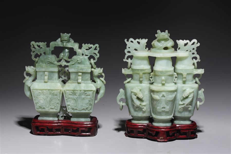 Appraisal: Two Chinese carved hardstone vases each with elaborate animal designs