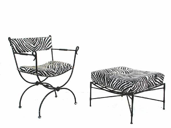 Appraisal: A suite of wrought metal garden furniture comprising a dining