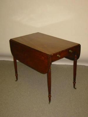 Appraisal: A GEORGIAN REVIVAL MAHOGANY PEMBROKE TABLE c of rounded oblong