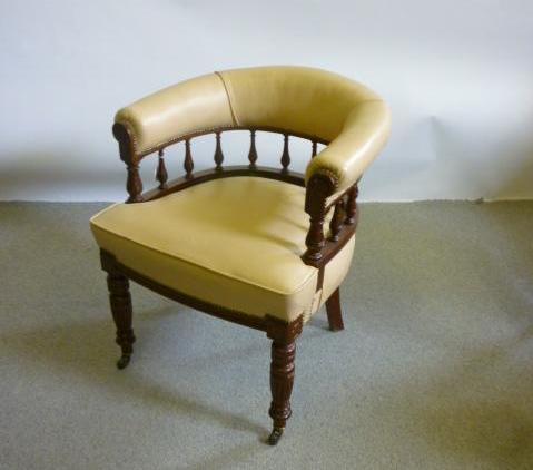 Appraisal: A WALNUT FRAMED TUB ARMCHAIR late th century upholstered in