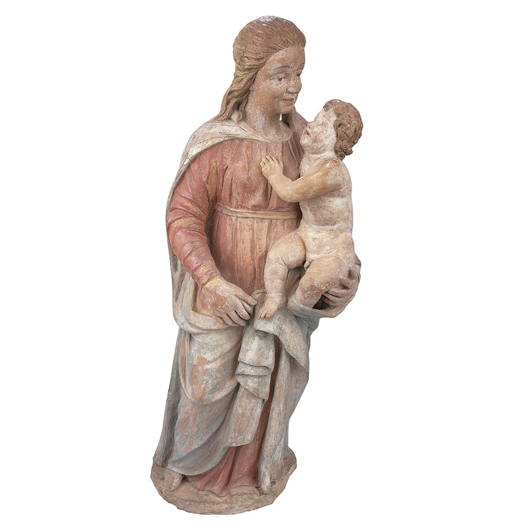 Appraisal: Continental Polychrome Decorated Terra Cotta Figural Group Of the Virgin