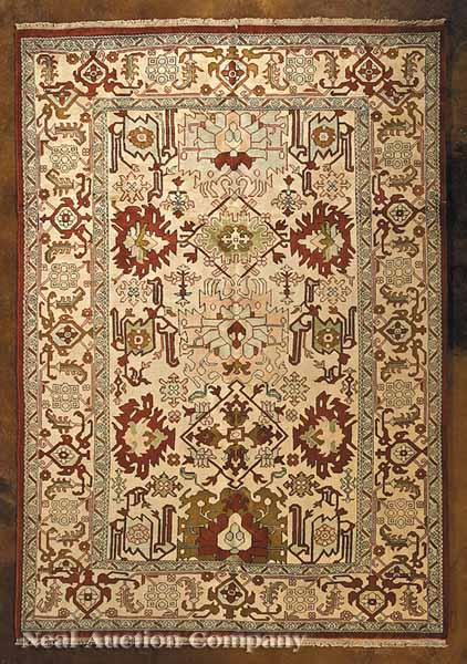 Appraisal: A Persian Serapi Carpet cream ground central field and border