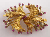 Appraisal: An carat gold and ruby brooch marked RHB and numbered