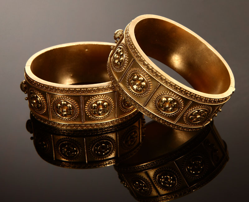 Appraisal: A pair of Etruscan Revival K yellow gold bangle bracelets