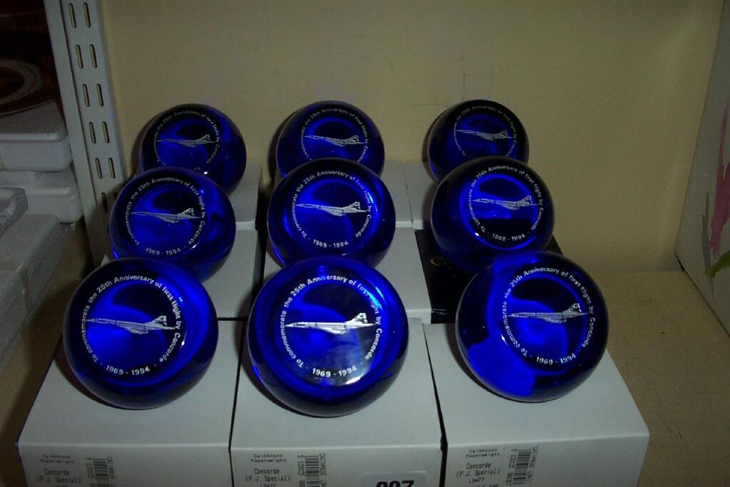 Appraisal: A collection of nine Aynsley blue glass limited edition paperweights