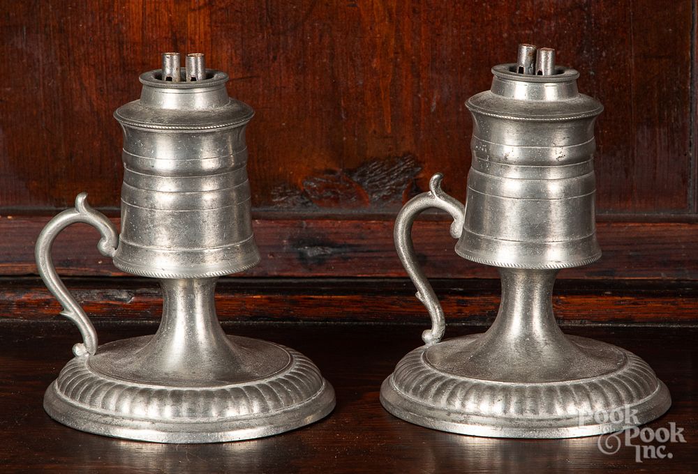 Appraisal: Pair of pewter whale oil lamps th c Pair of