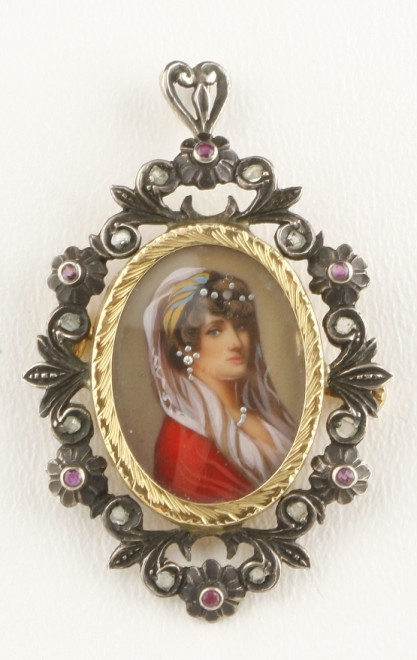 Appraisal: KY and silver pendant features portrait of young woman red