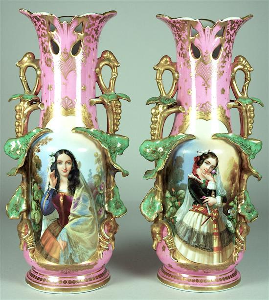 Appraisal: Pair of French Portrait Vases Vine and leaf handles encircle