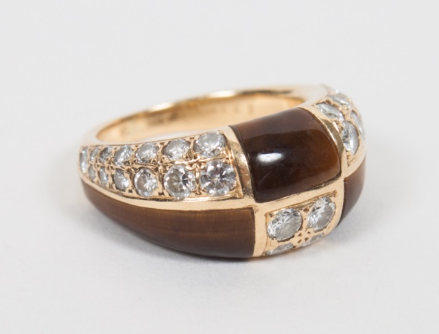 Appraisal: Van Cleef Arpels K diamond tiger eye ring presenting alternating